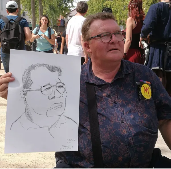 Caricature au trait : la silhouette et l'expression tenues en une seule attaque de crayon.